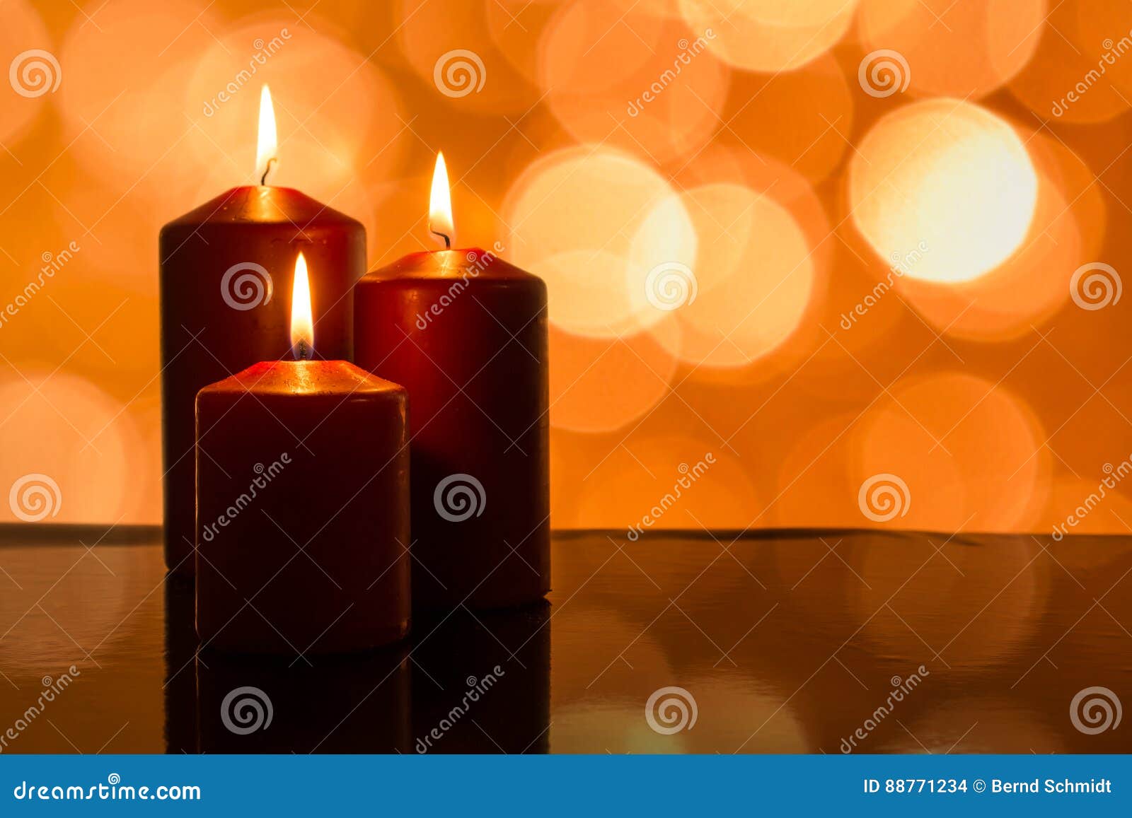 Burning Christmas Candles with Lights As Bokeh Stock Photo Image of