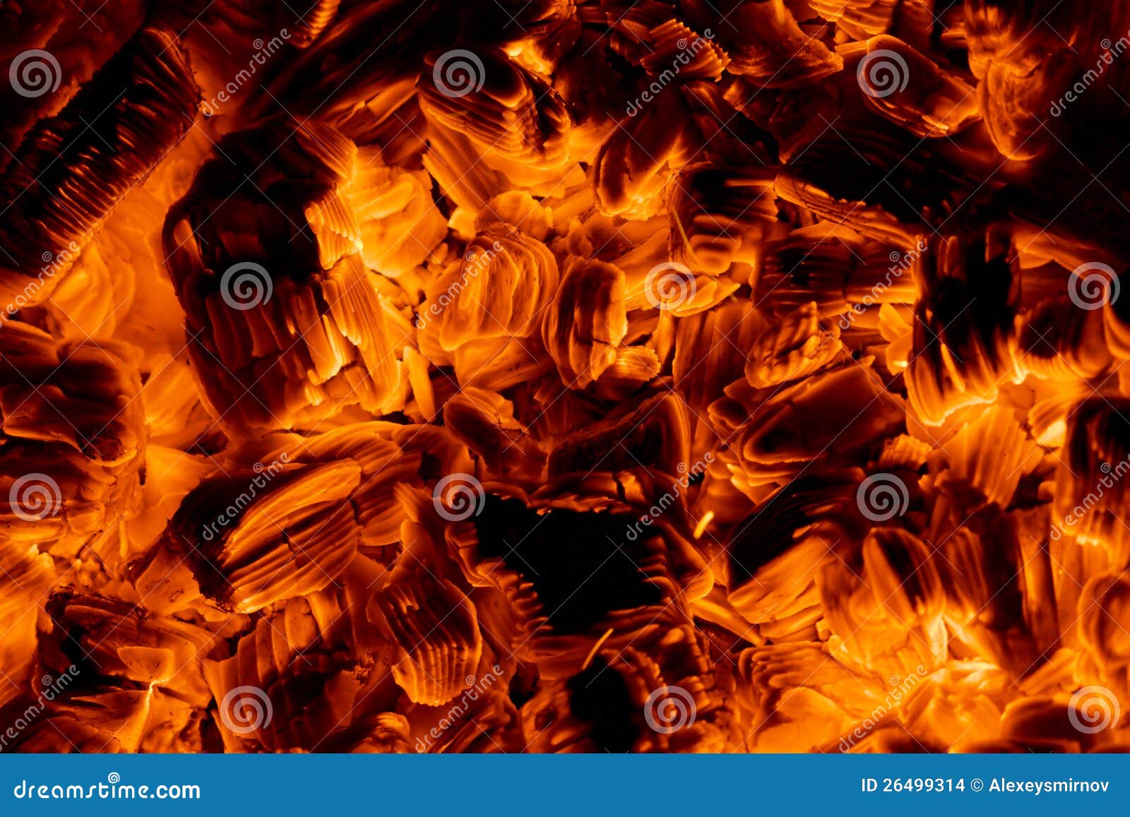 Burning embers in the dark stock photo. Image of glow 26499314