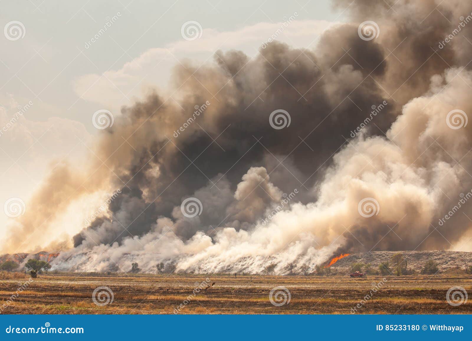 Burning Garbage Heap of Smoke from a Burning Pile Stock Photo Image