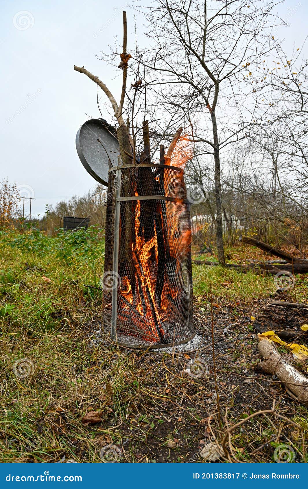 Burning Garden Disposal in an Old Garbage Bin Stock Image Image of
