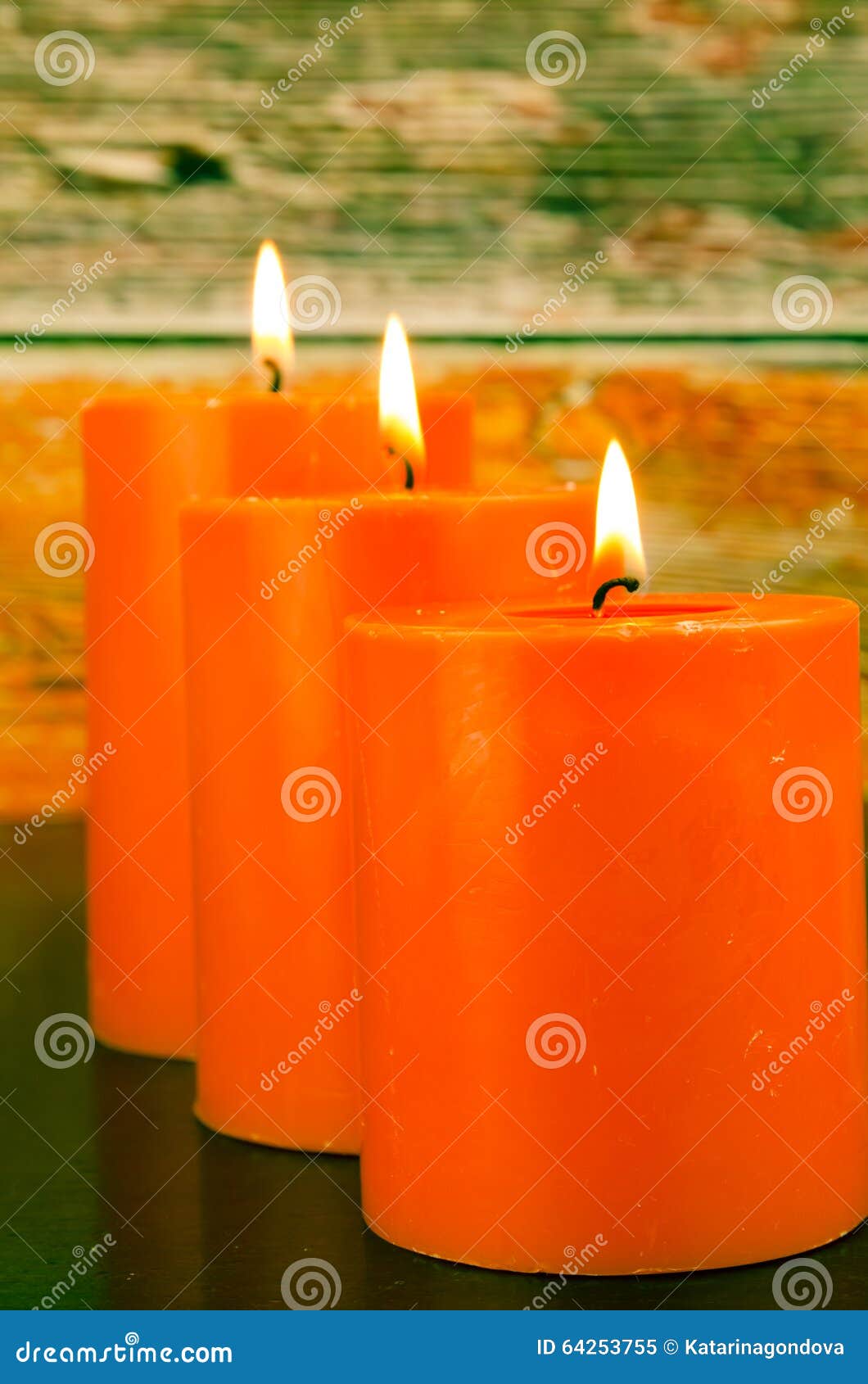 Burning orange candles stock image. Image of therapy 64253755