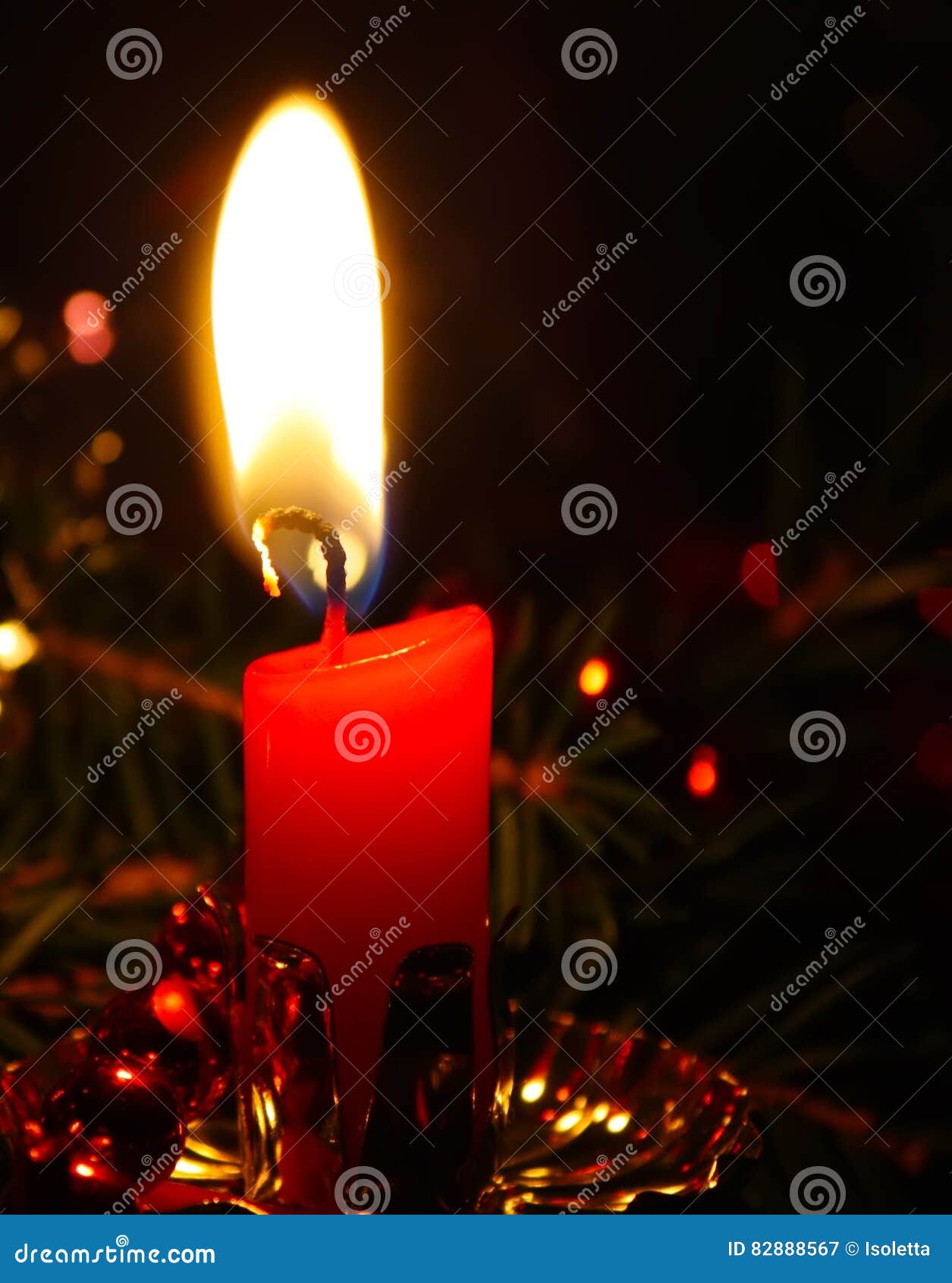 Burning red candle flame stock image. Image of holiday 82888567