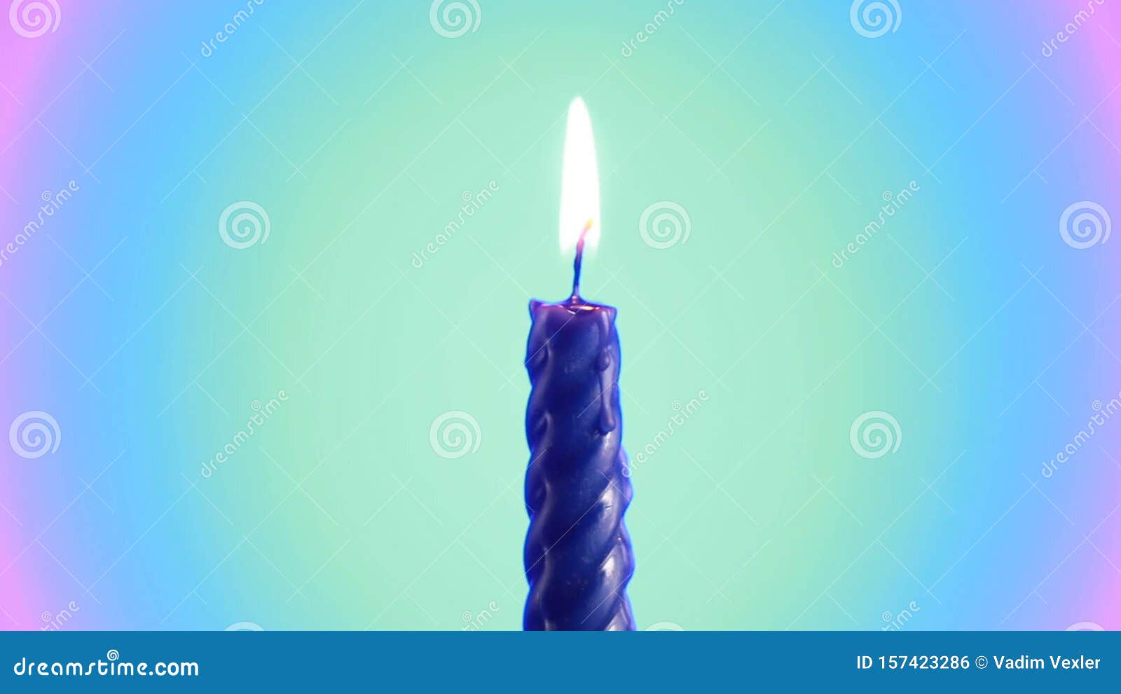 Burning and Rotating Blue Candle with Burning Flame Stock Footage