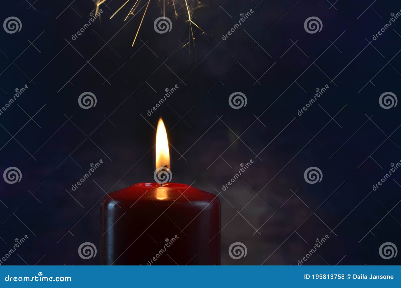 Burning Single Red Candle with Dancing Flame on the Dark Background