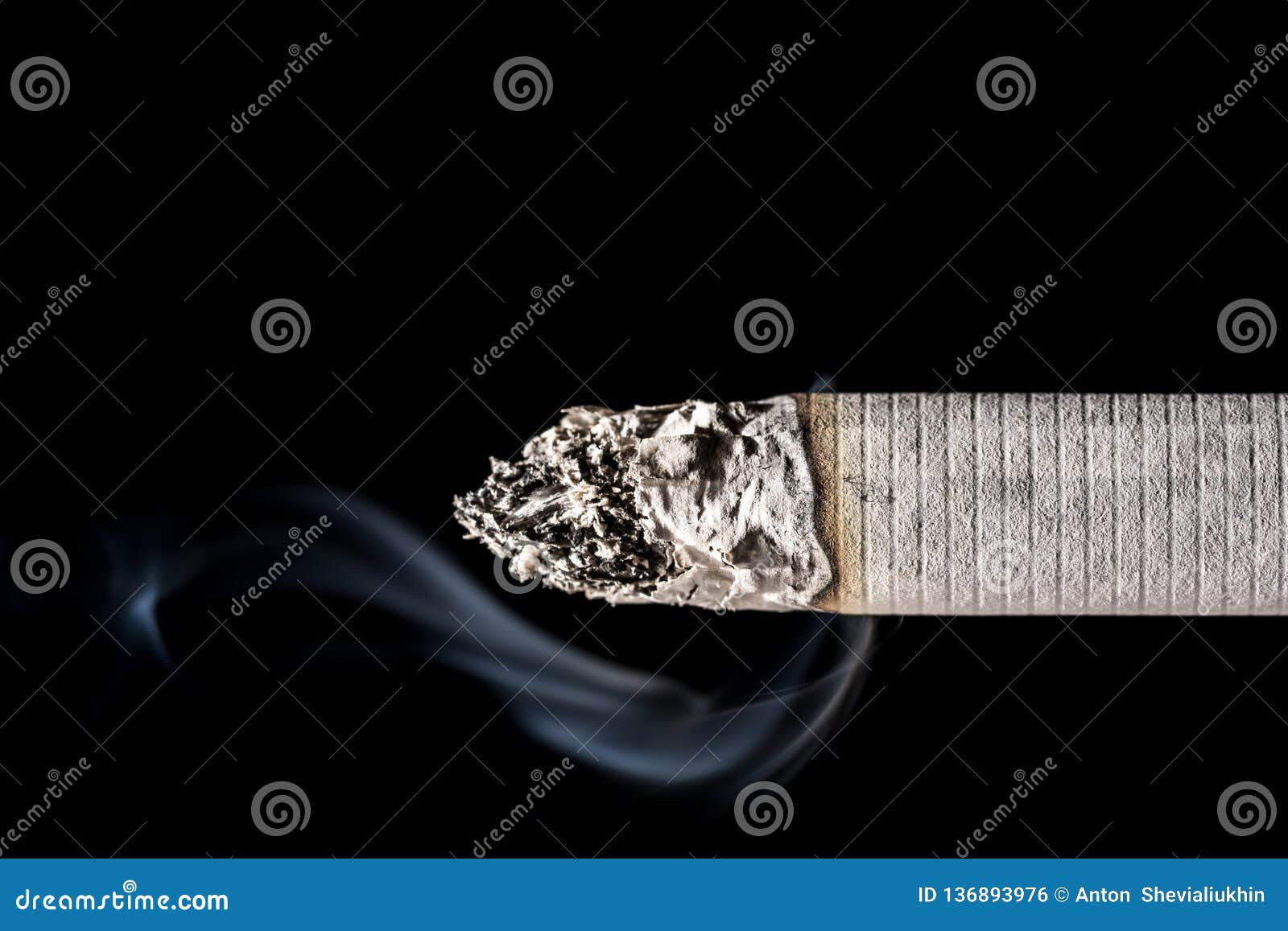 Burning Smoldering Smoking Cigarette Close-up with Beautiful Smoke ...
