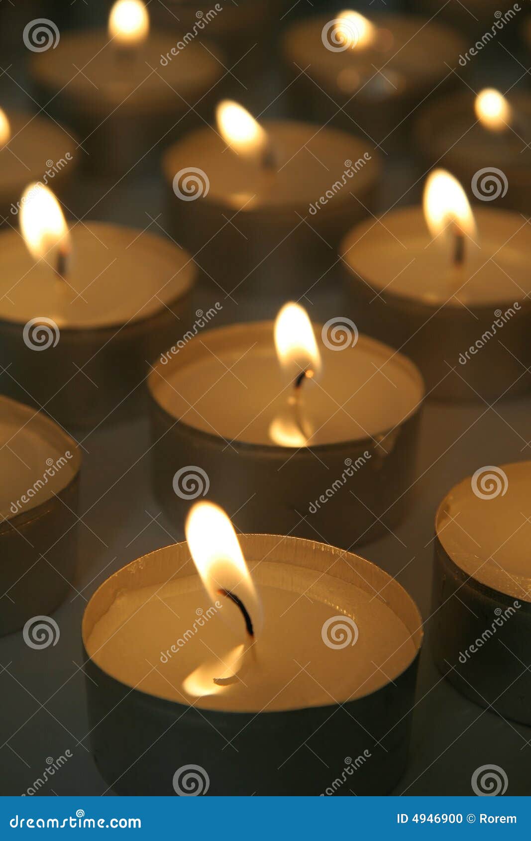 Burning tea light candles stock photo. Image of illuminating 4946900