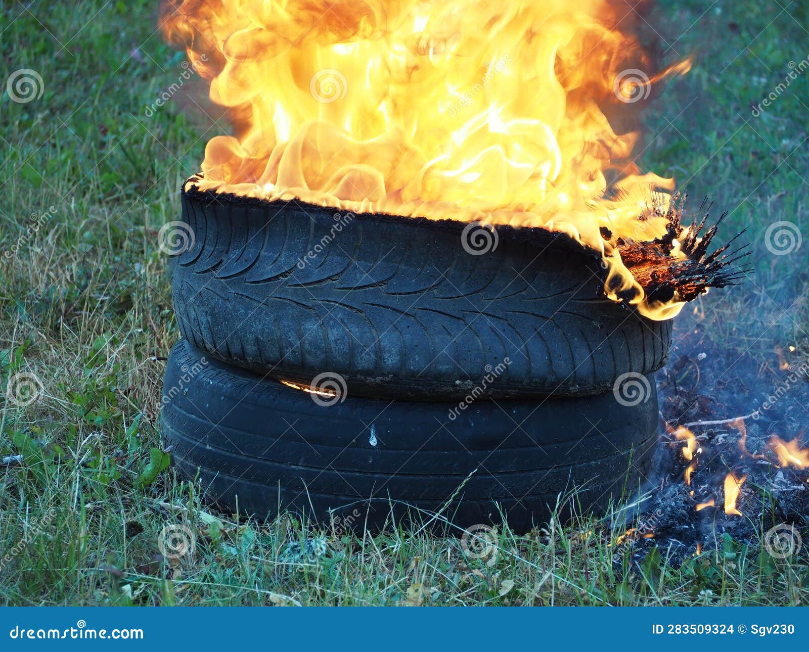 Burning Tires. Environmental and Ecological Problems Stock Photo