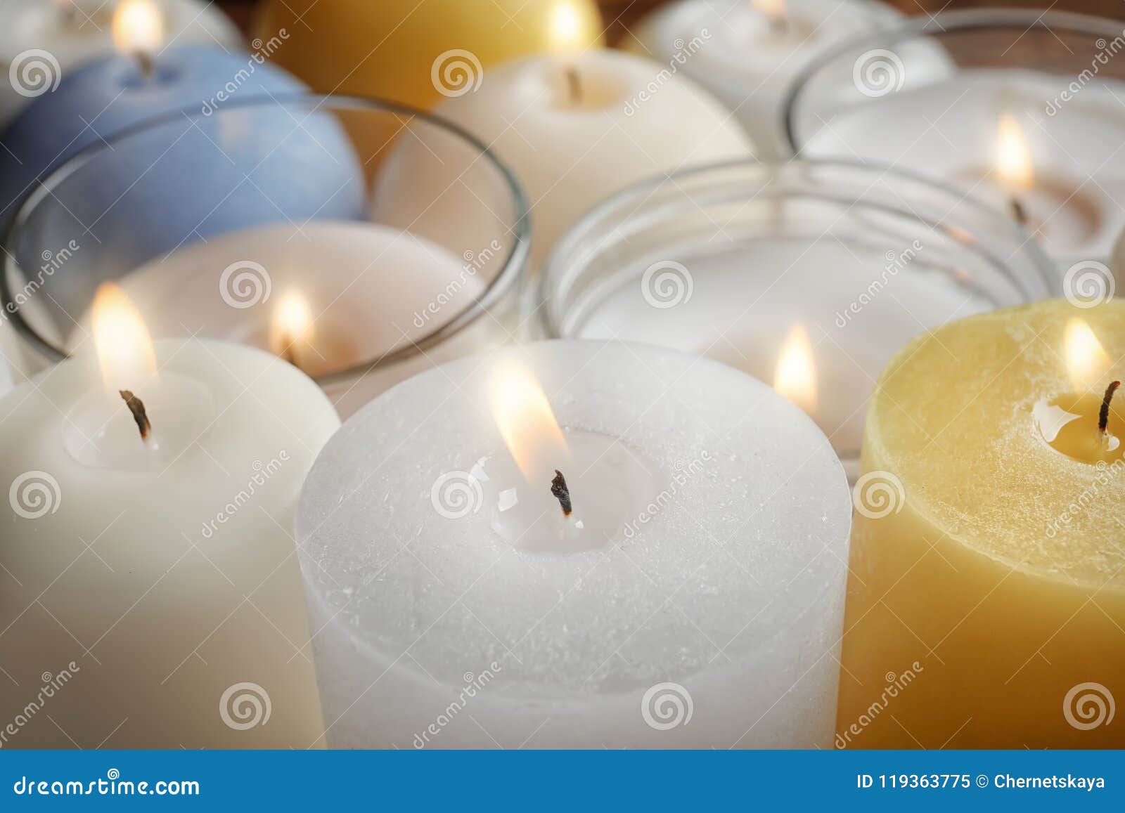 Burning Wax Candles of Different Shapes and Colors Stock Image Image