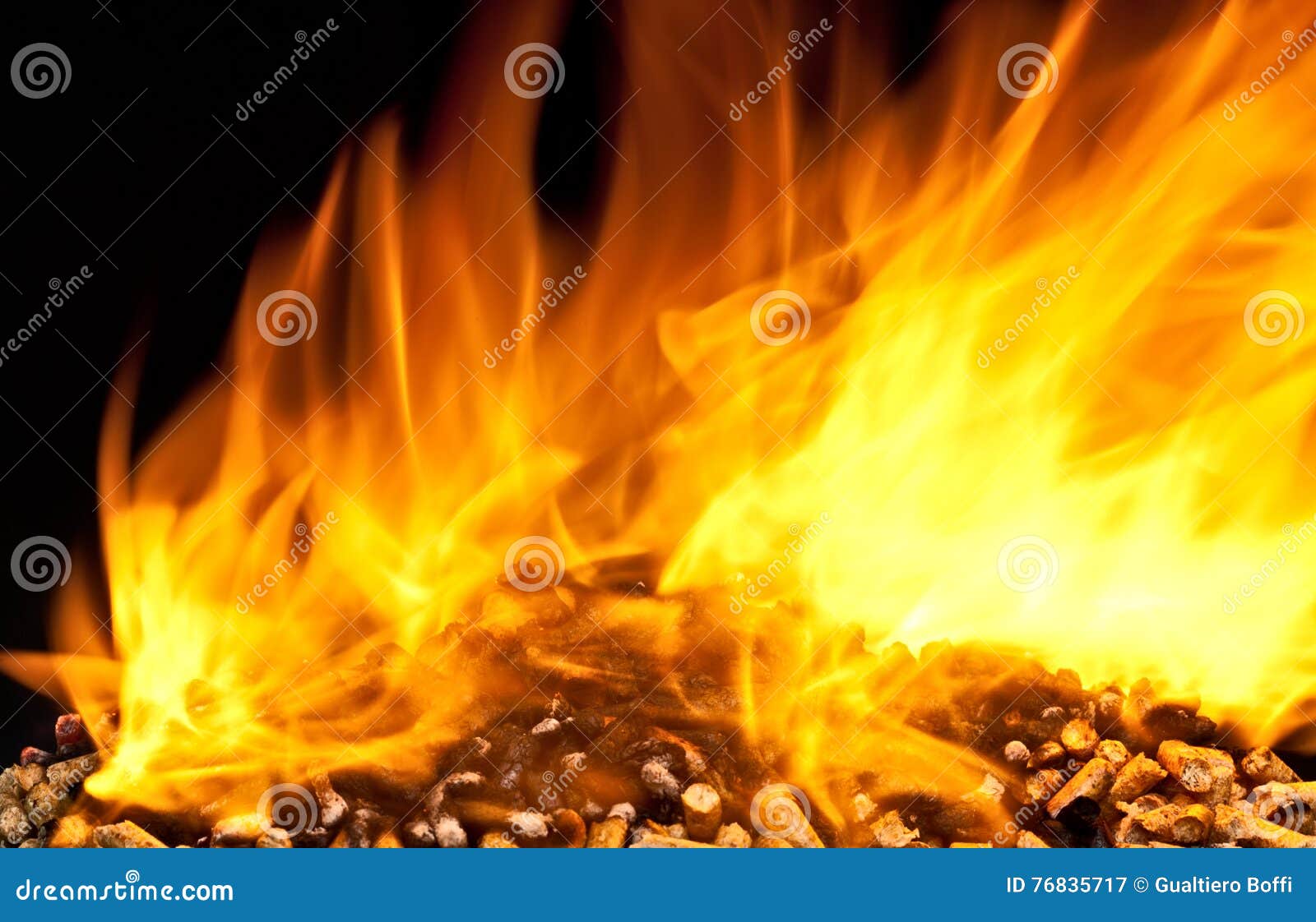 Burning wood pellet stock image. Image of wooden, renewable 76835717