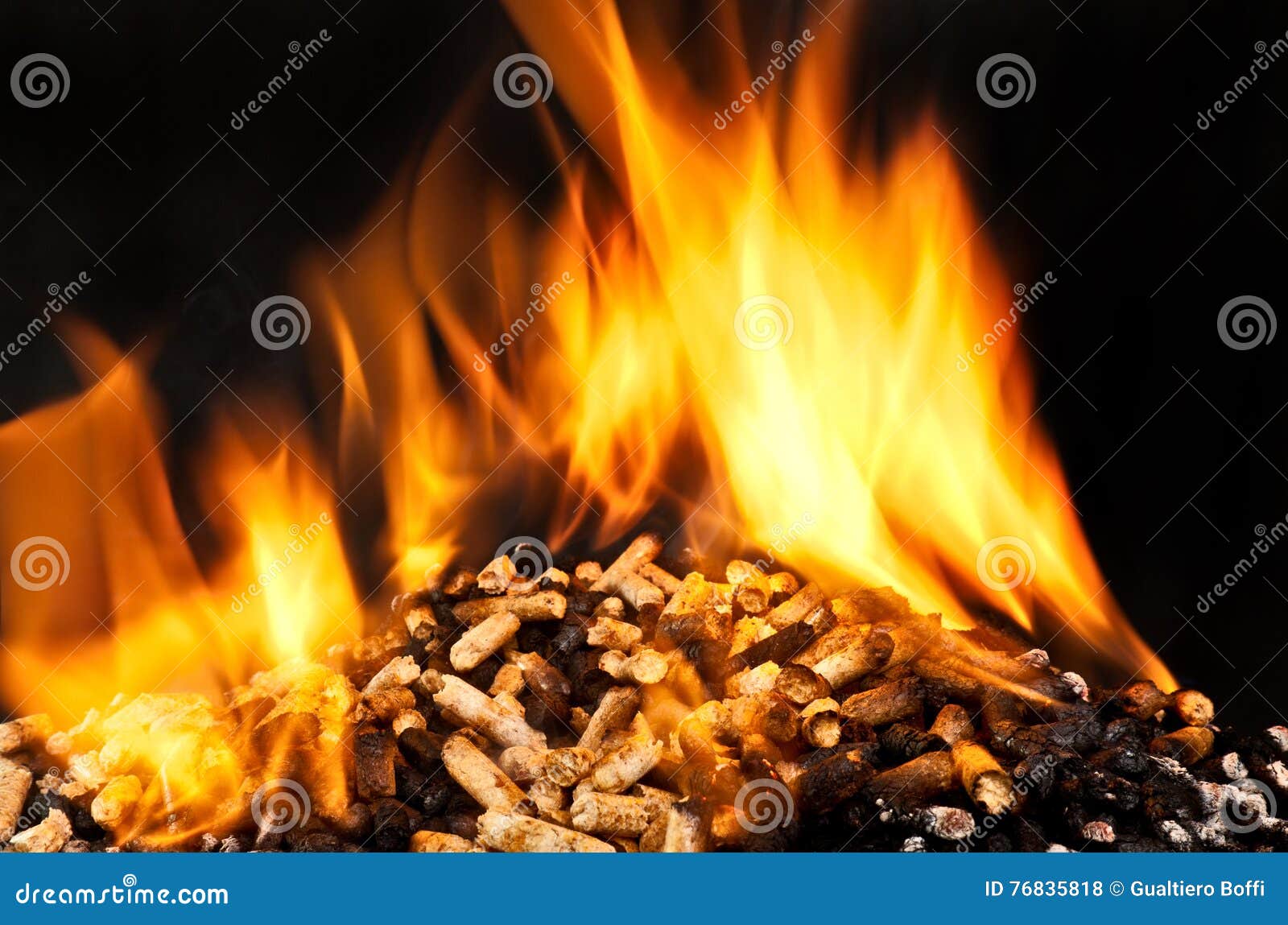 Burning wood pellet stock photo. Image of renewable, fireplace 76835818