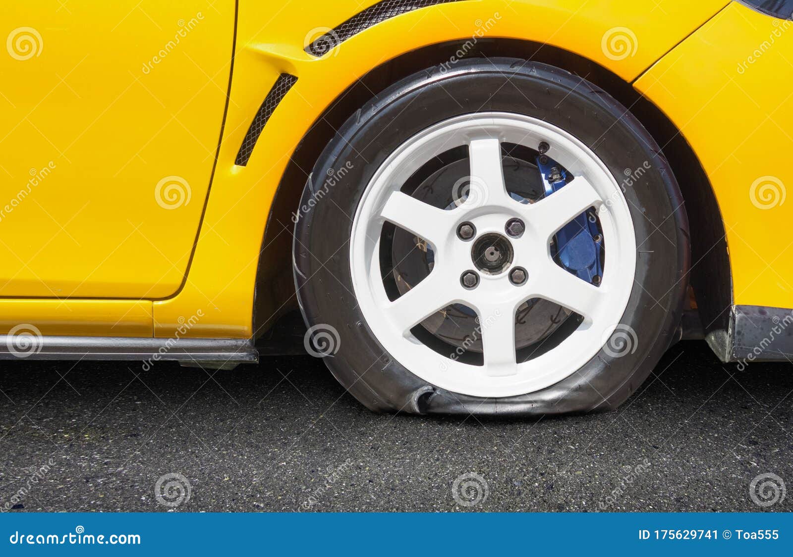 Burst car tire on road stock image. Image of road, accident 175629741