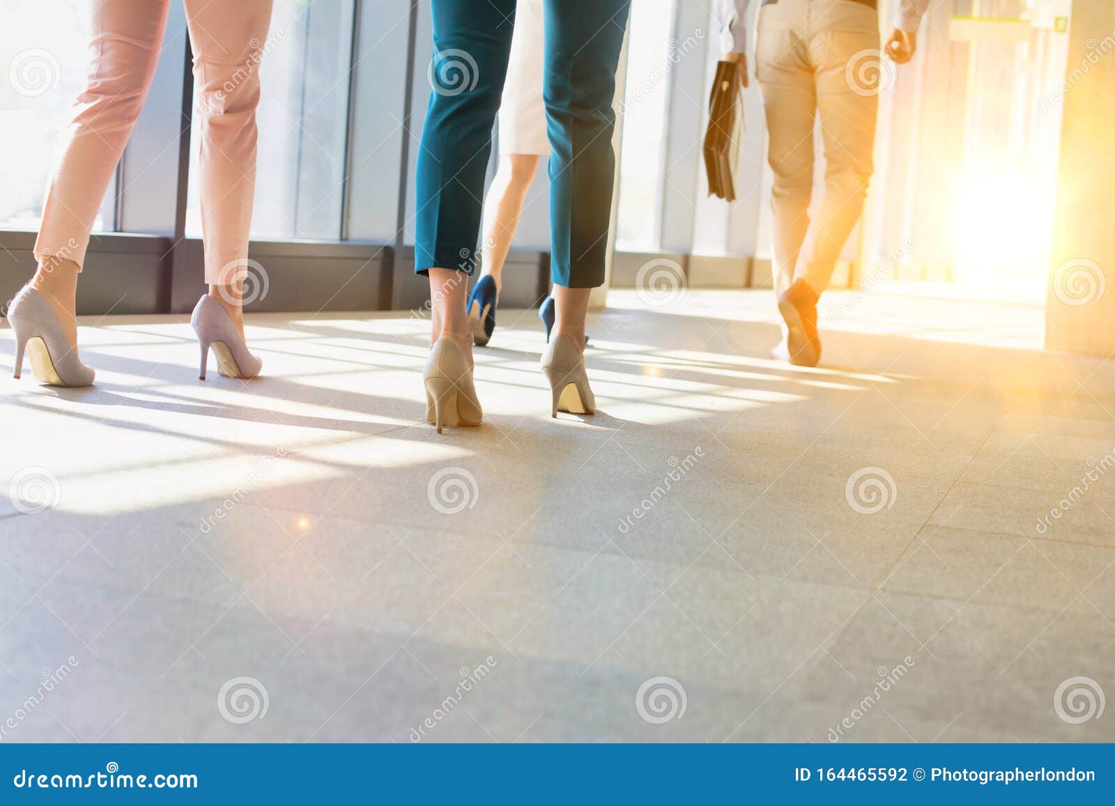 busines people walking in office hall