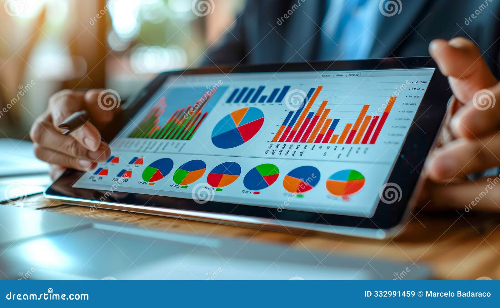 business analysis on tablet screen, image with colorful graphs