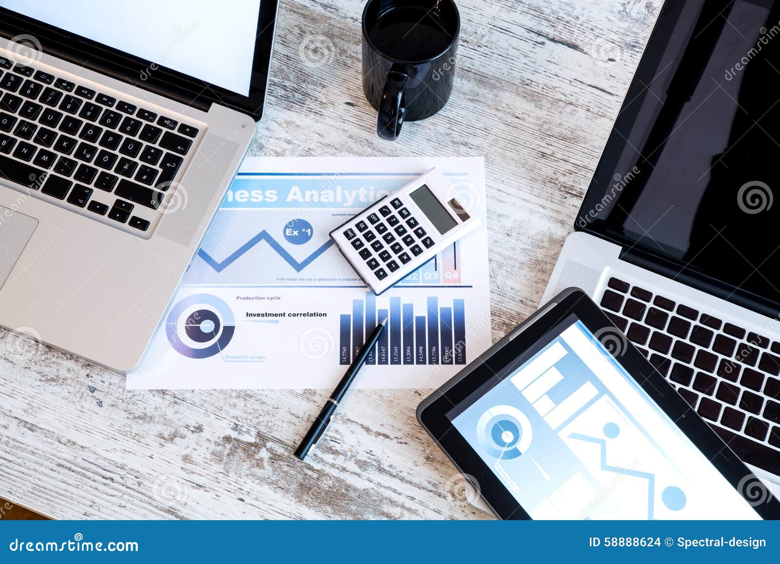 Business Analytics with a Tablet PC and a Laptop Stock Photo Image of