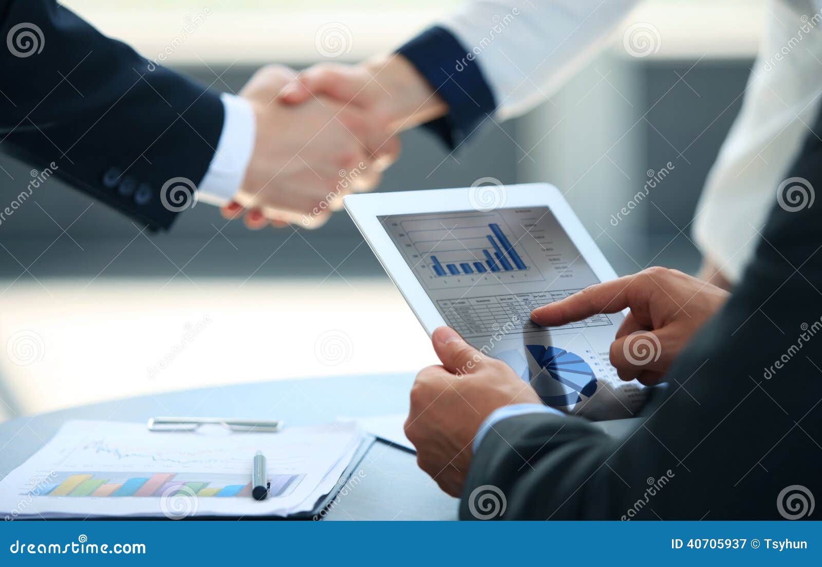 business associates shaking hands