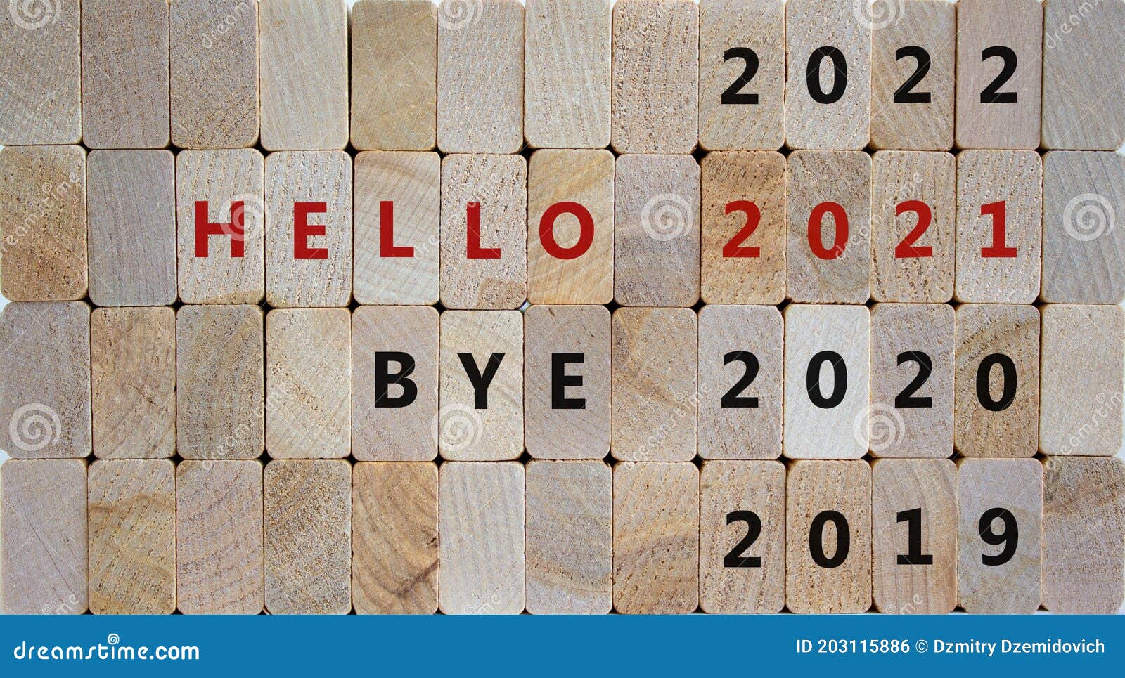 business concept of 2021 new year. wooden blocks with the words `bye 2020, hello 2021`. 2019, 2022 numbers. beautiful wooden