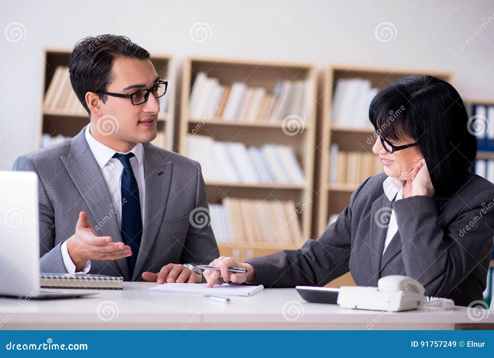 The Business Couple Having Discussion in the Office Stock Image Image