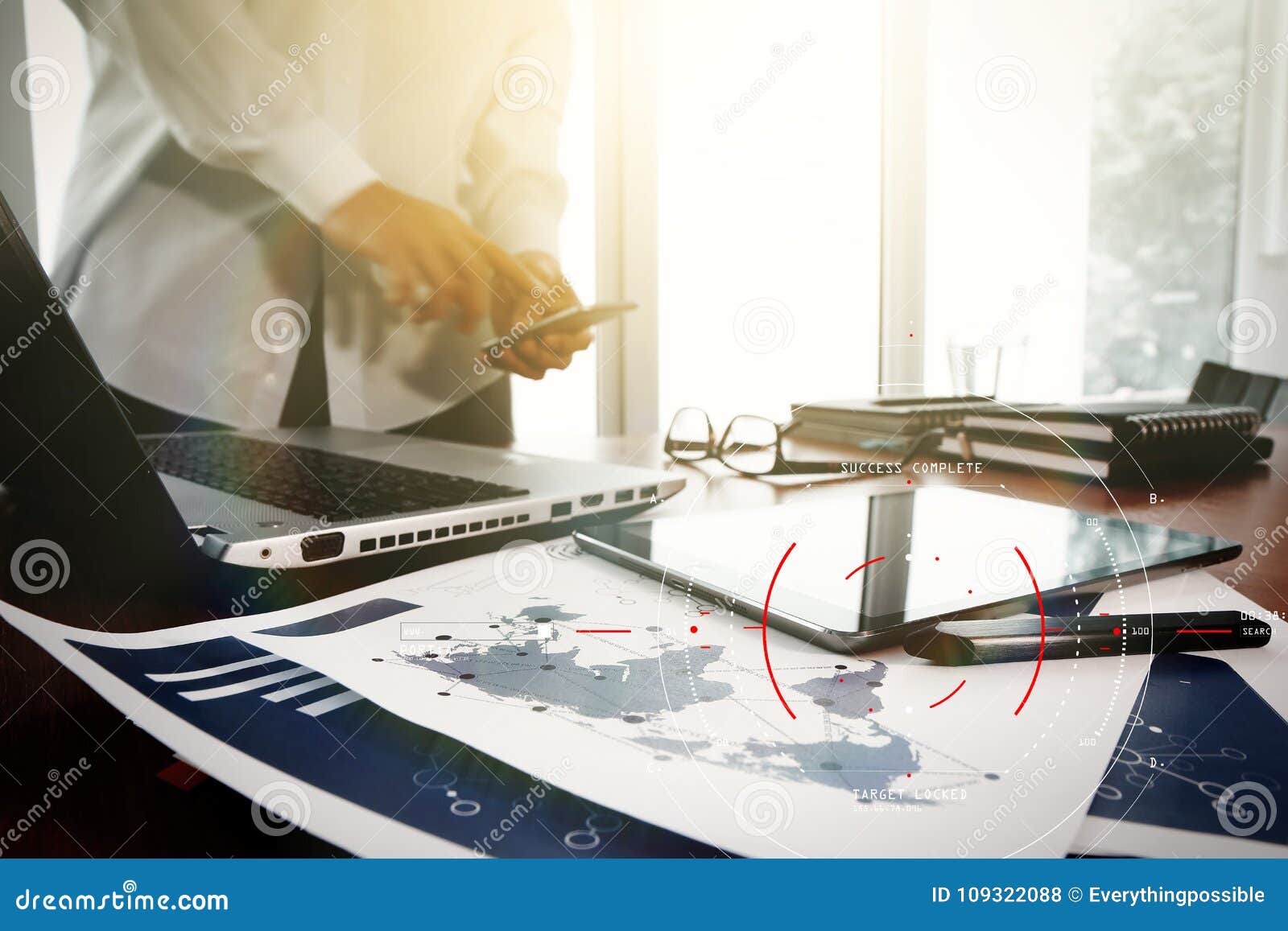 business documents on office table with smart phone and digital