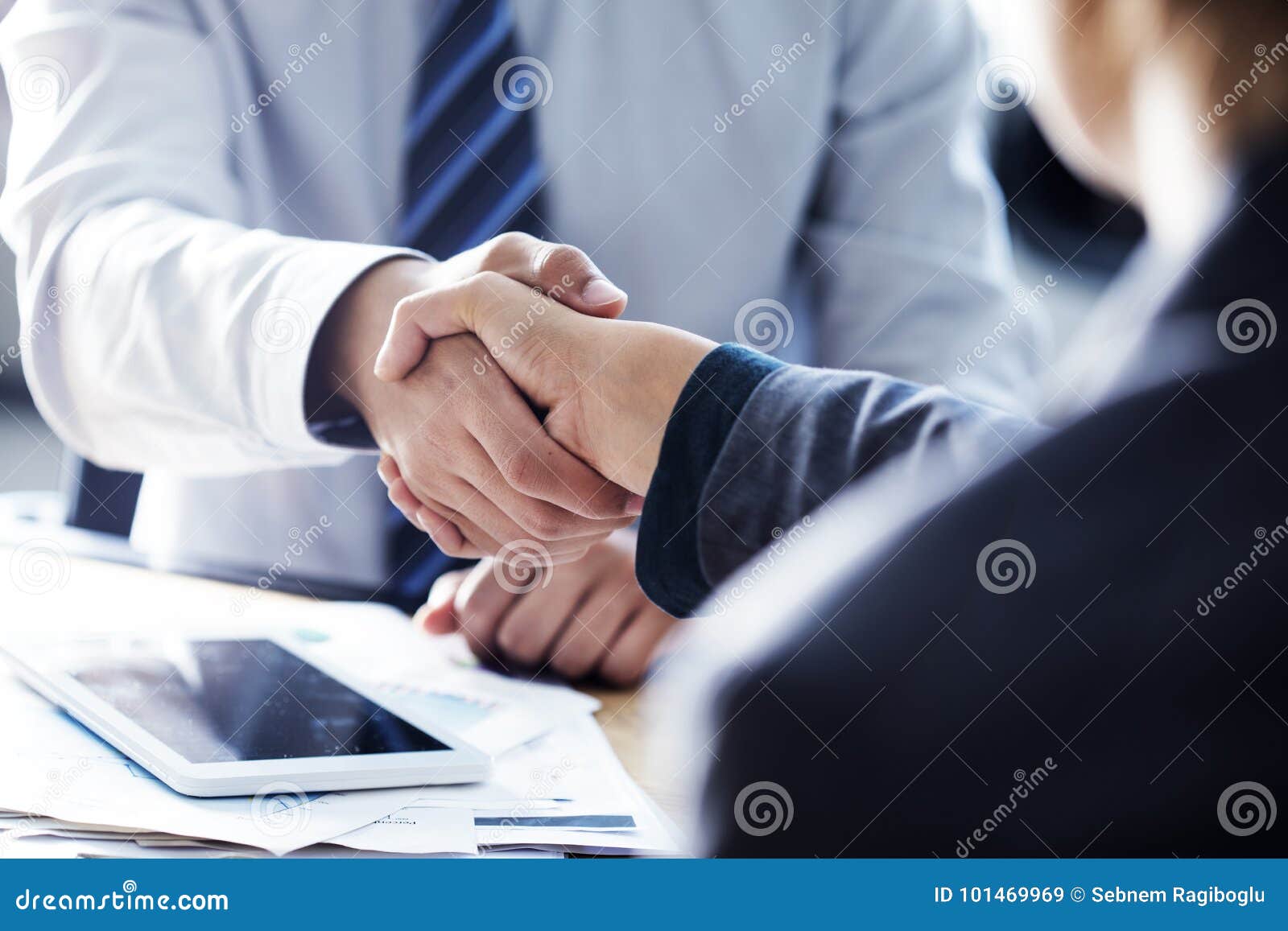 business handshake in the office