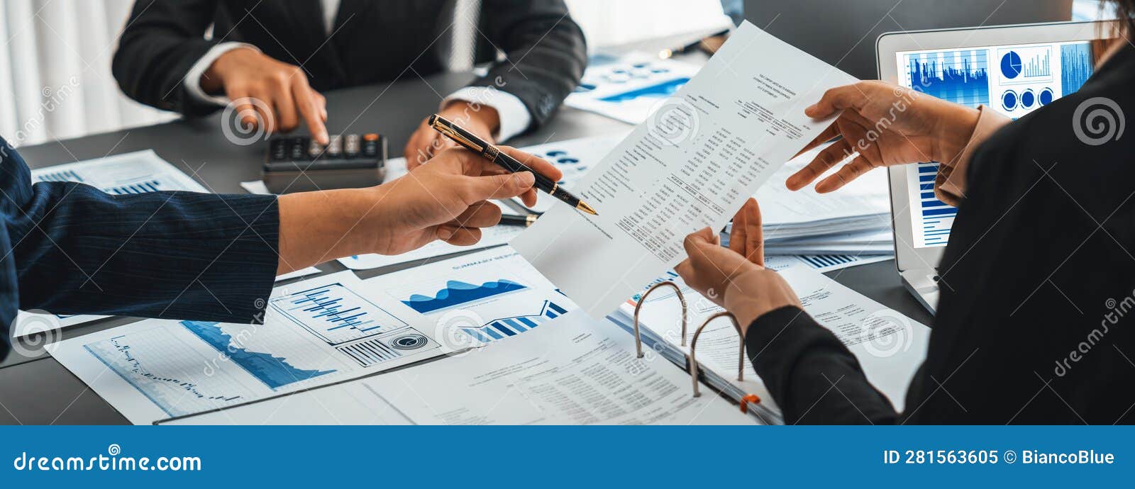 Analyst Team Working on Data Analysis Dashboard on Laptop Screen