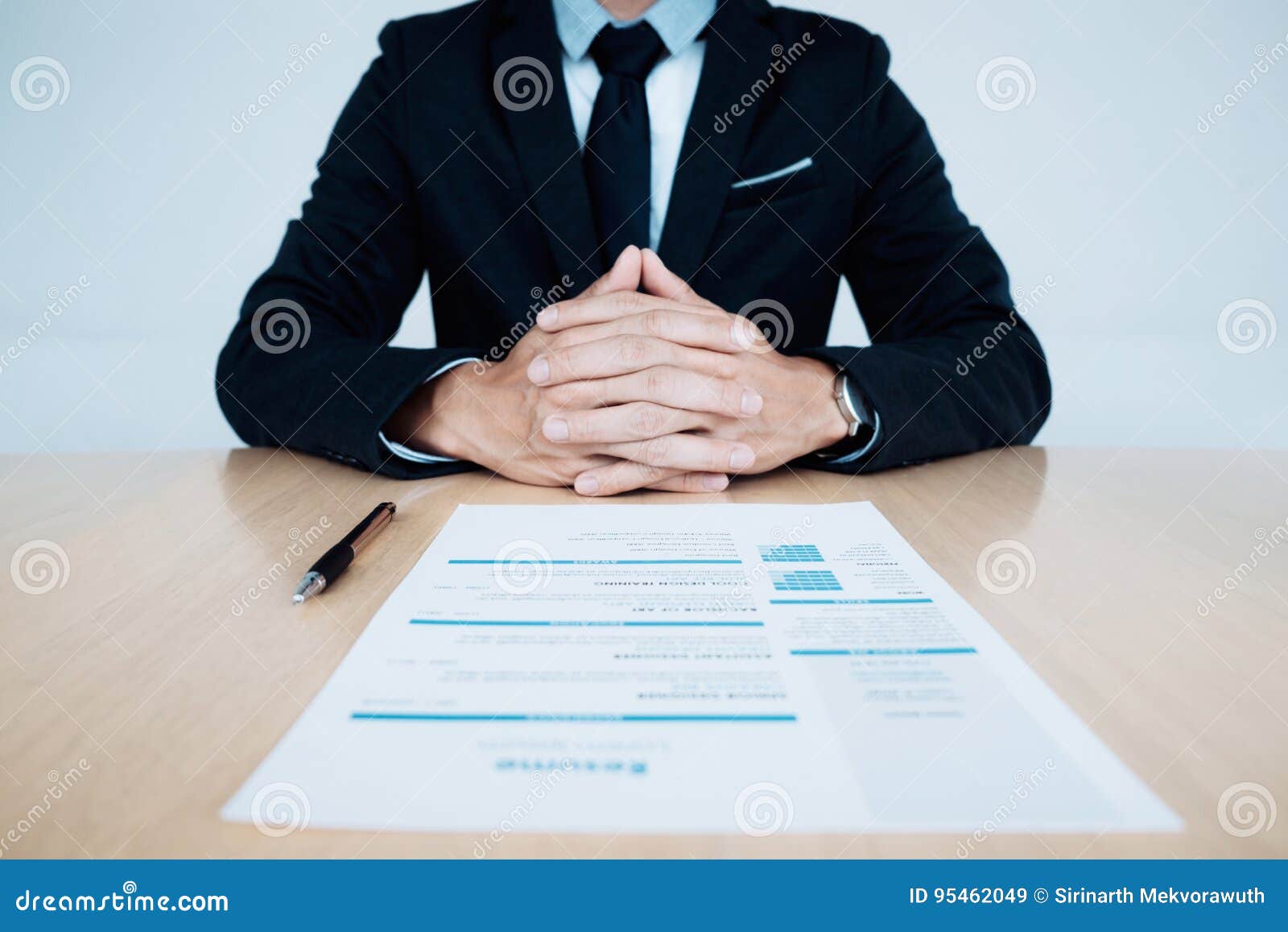 business job interview. hr and resume of applicant on table.