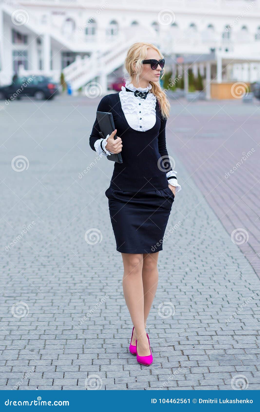 Business Lady Woman Dressed in Working Serious Skirt and Shirt Posing on Street with Note Book Blond Hairs and Pink High Heels Sex Stock Image