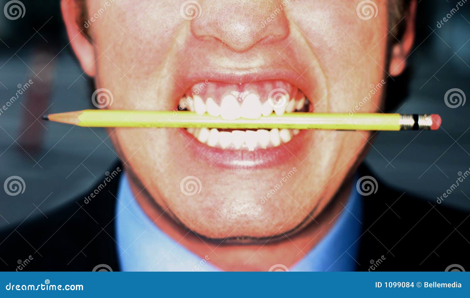 Business man biting pencil stock photo. Image of advertising 1099084