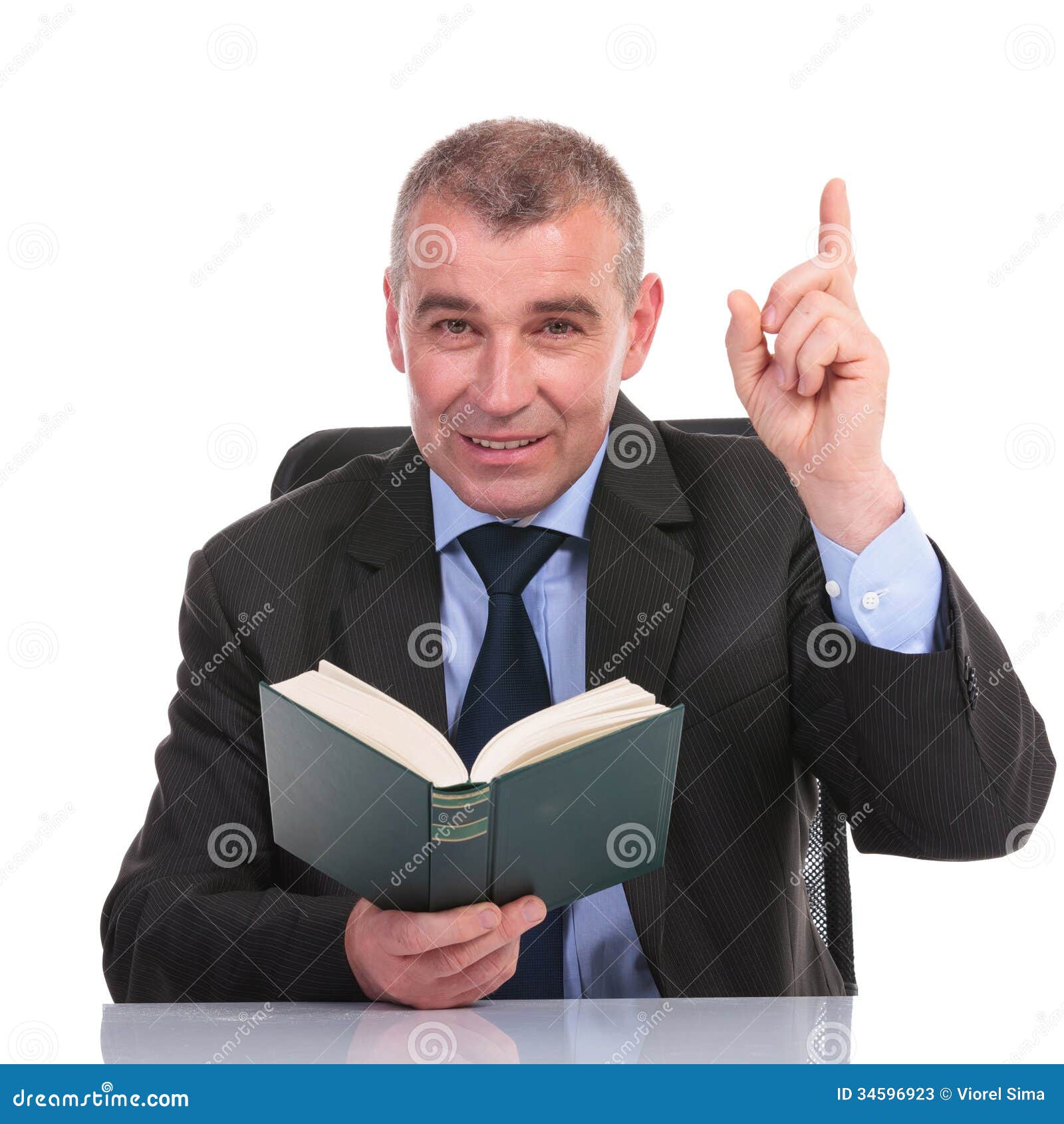 Business Man With Book Points Up Stock Image Image 34596923