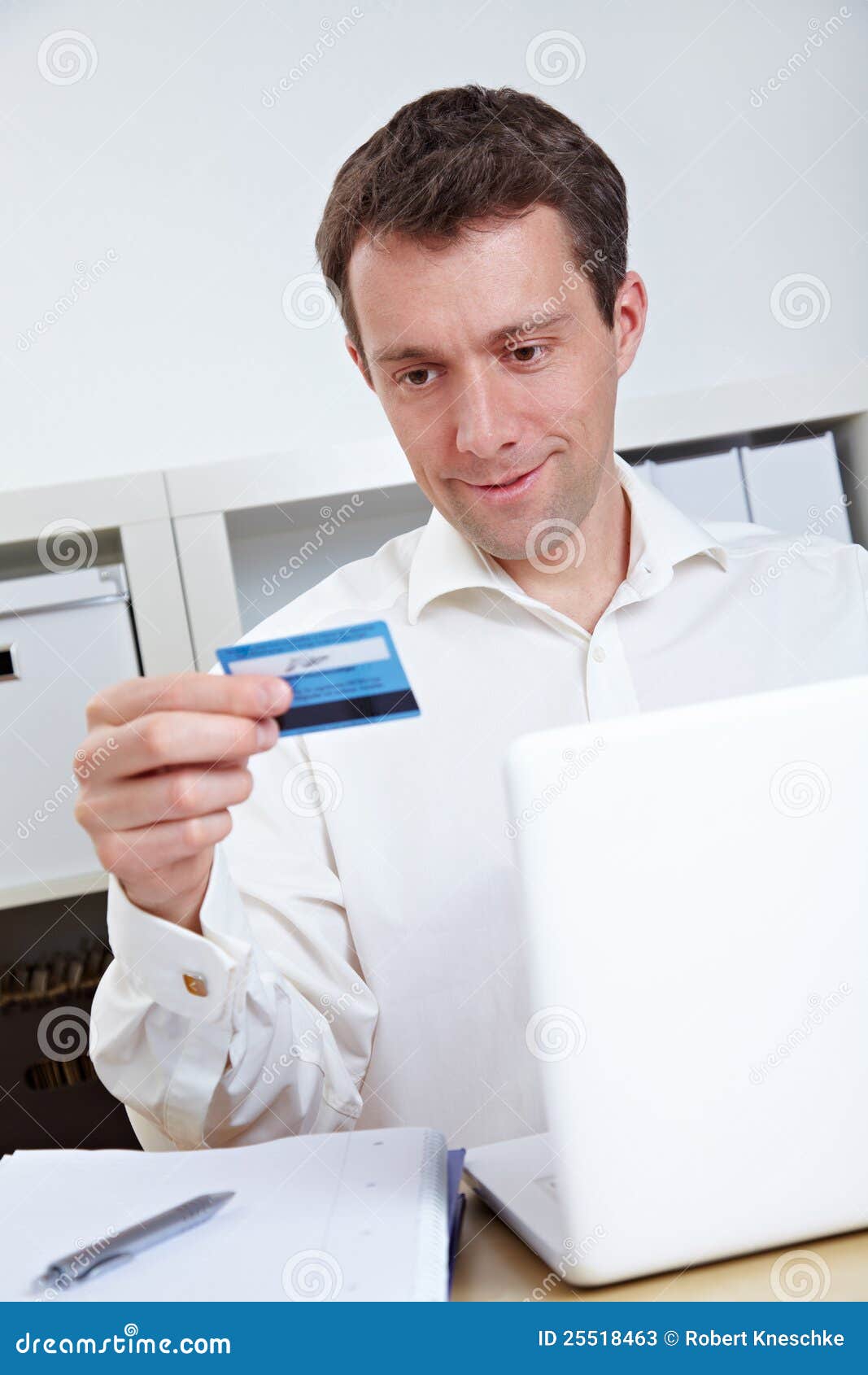Business man buying online stock image. Image of laughing 25518463