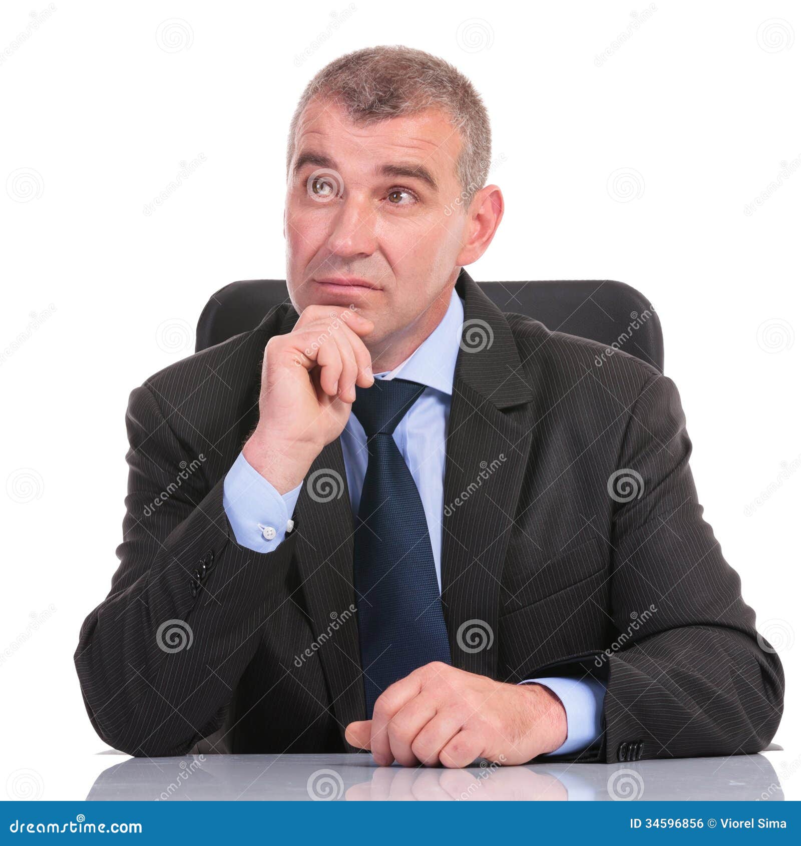 business-man-desk-looks-away-pensively-sitting-looking-holding-his-hand-his-chin-white-background-34596856.jpg