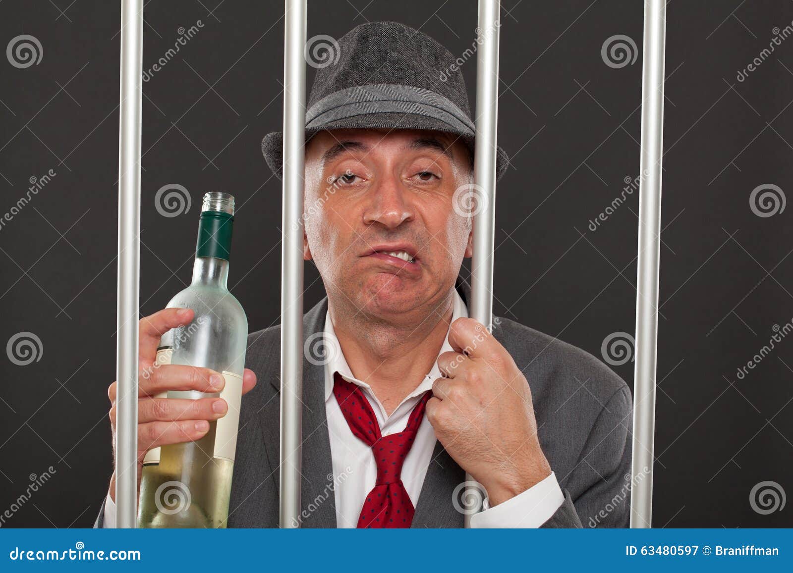 Business man drunk in jail stock image. Image of beverage 63480597