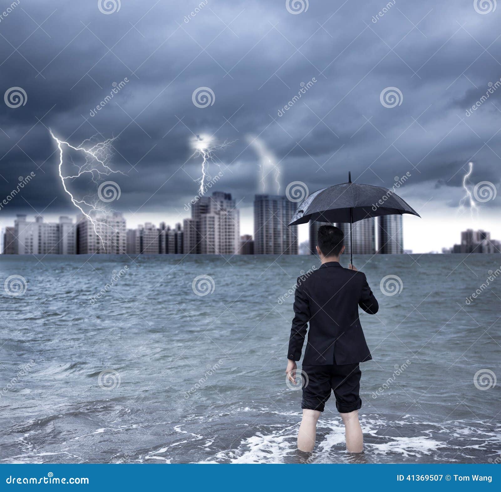 business man holding an umbrella with thundershower