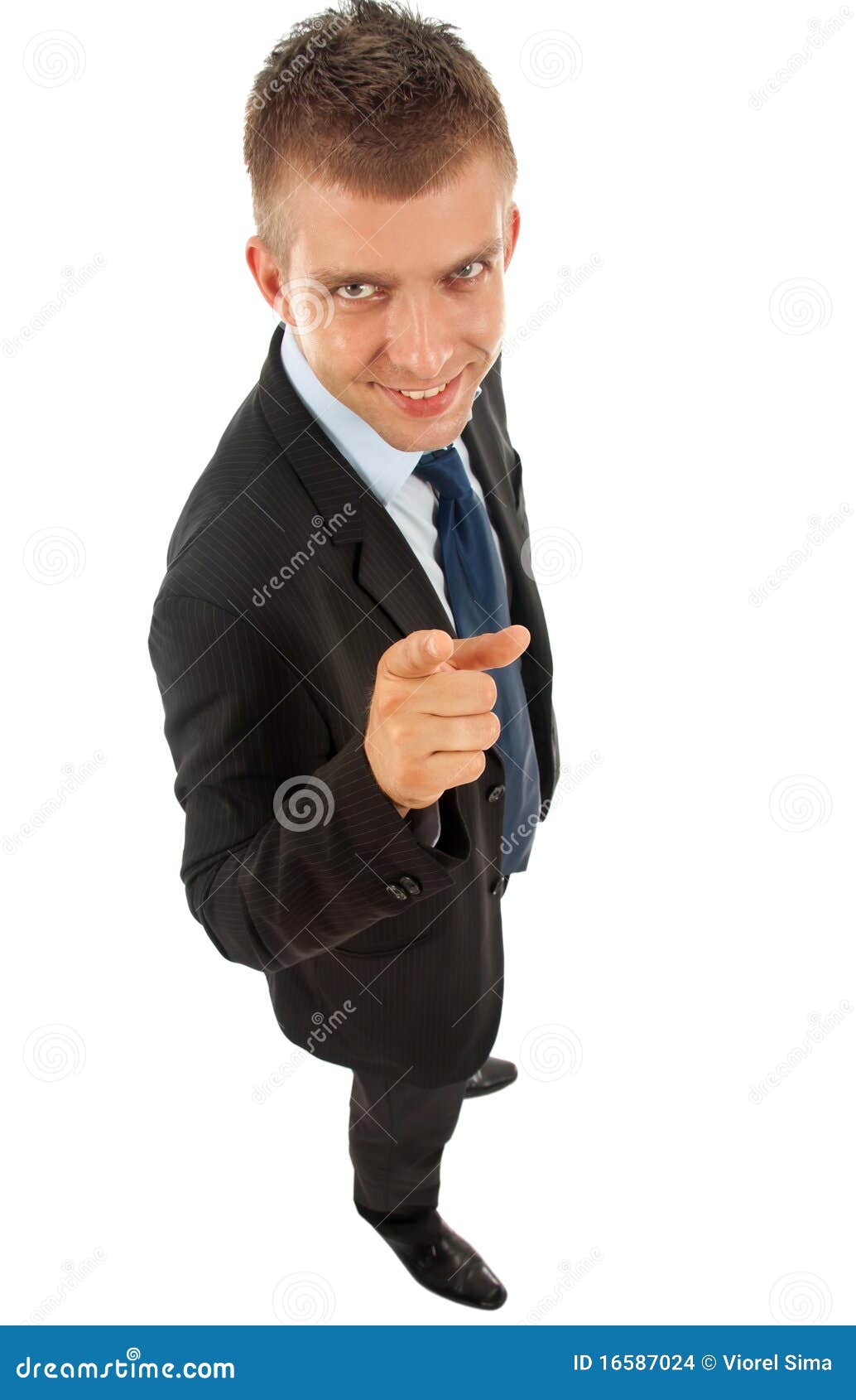 Wide angle picture of a business man pointing at camera