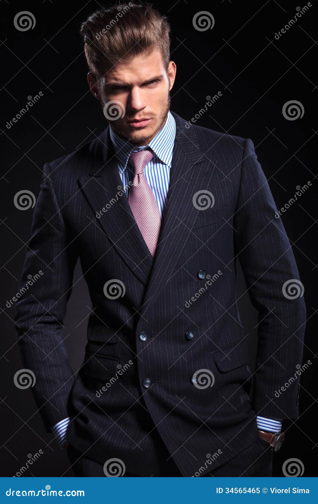 Business Man Standing with His Hands in Pockets Stock Image - Image of ...