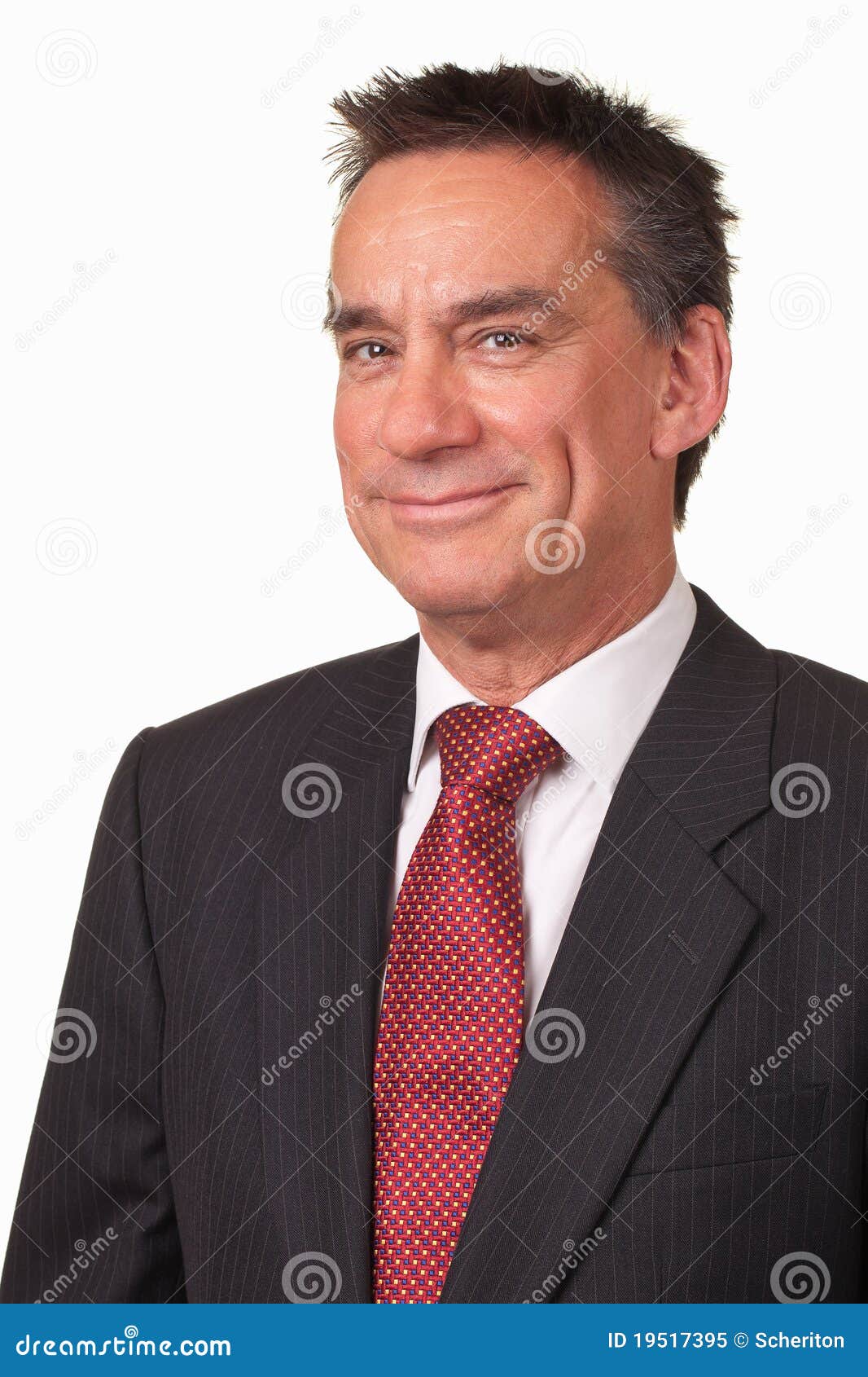 business man in suit with cheeky grin
