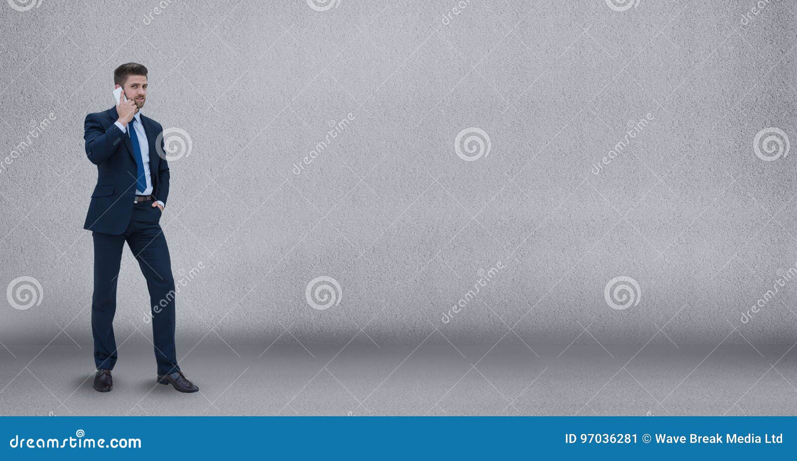Business Man Talking on the Phone Against Grey Wall Background Stock ...