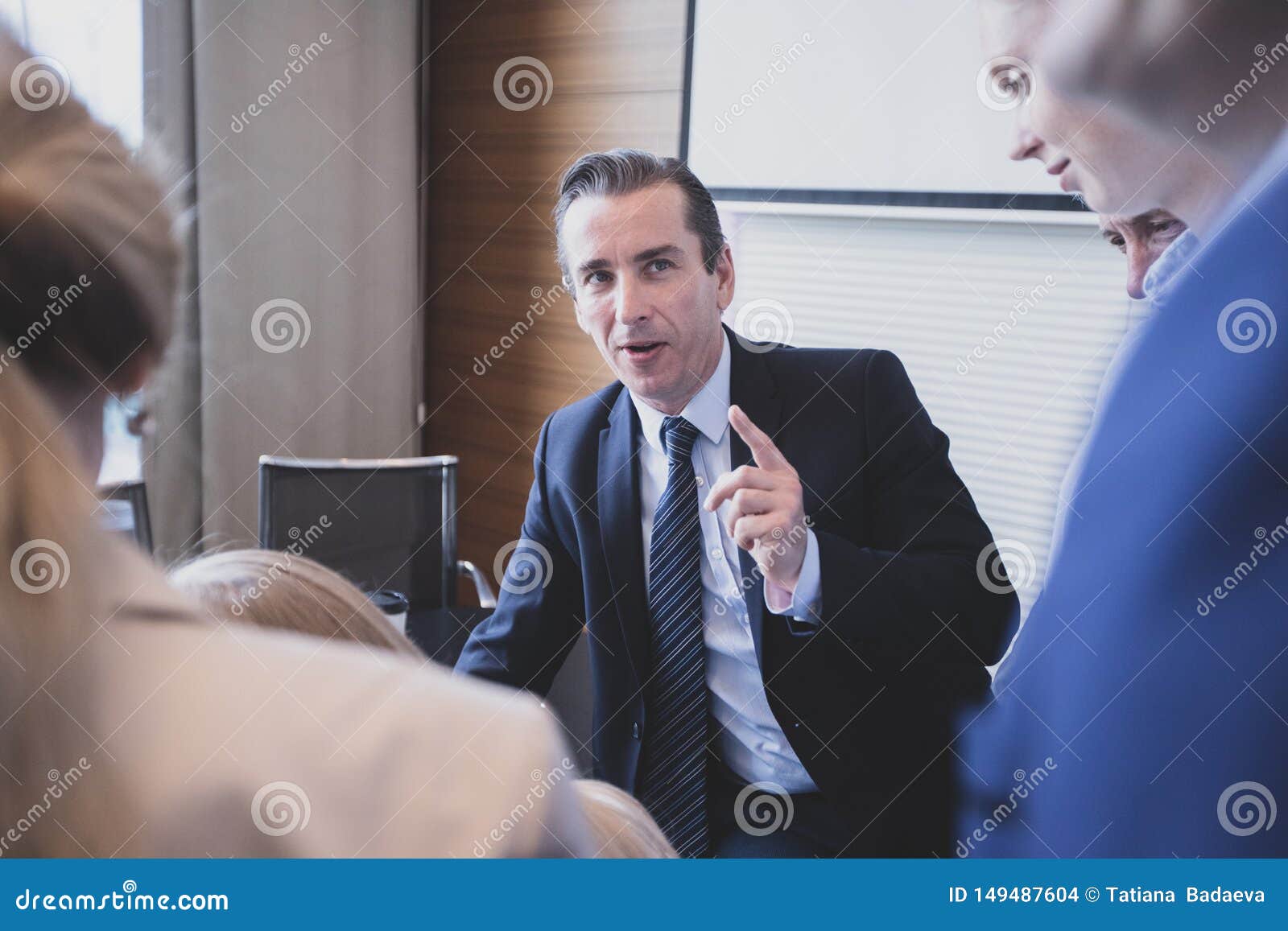 Business Man Talking To His Colleagues Stock Photo - Image of education ...