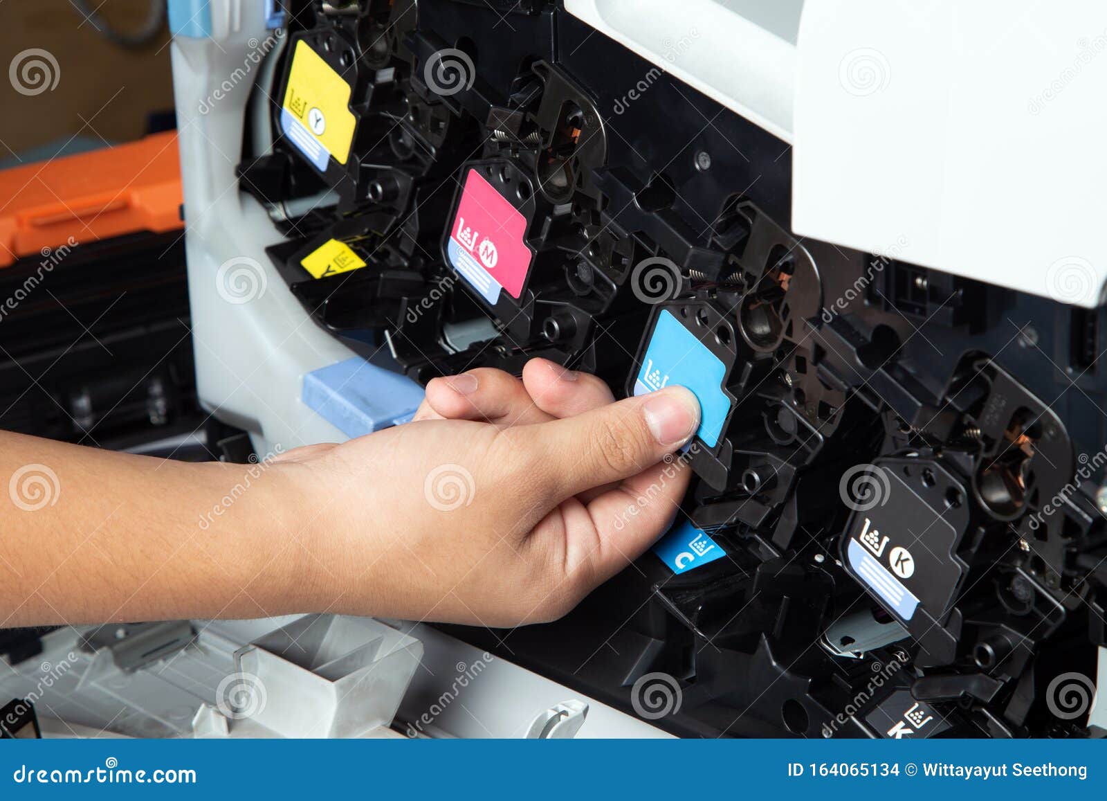 Business Man or Technician is Pushing or Pulling the Printer Equipment