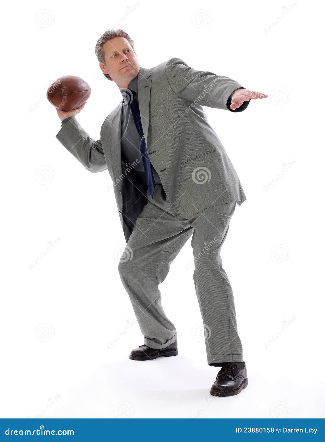 business-man-throwing-football-23880158.jpg