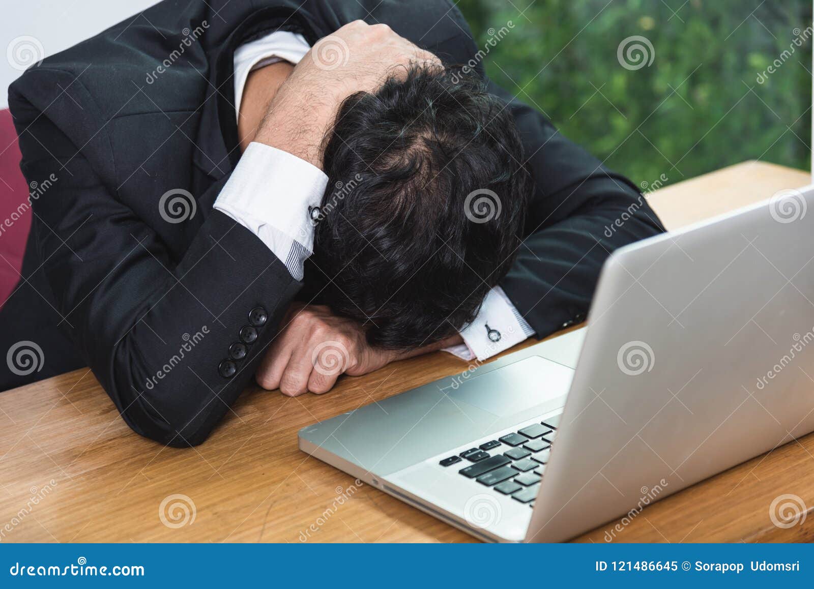 Business Man Unhappy Head Down On Laptop Computer Stock Image