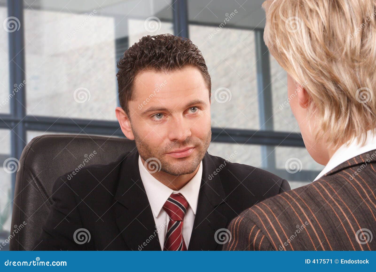 business man and woman talk