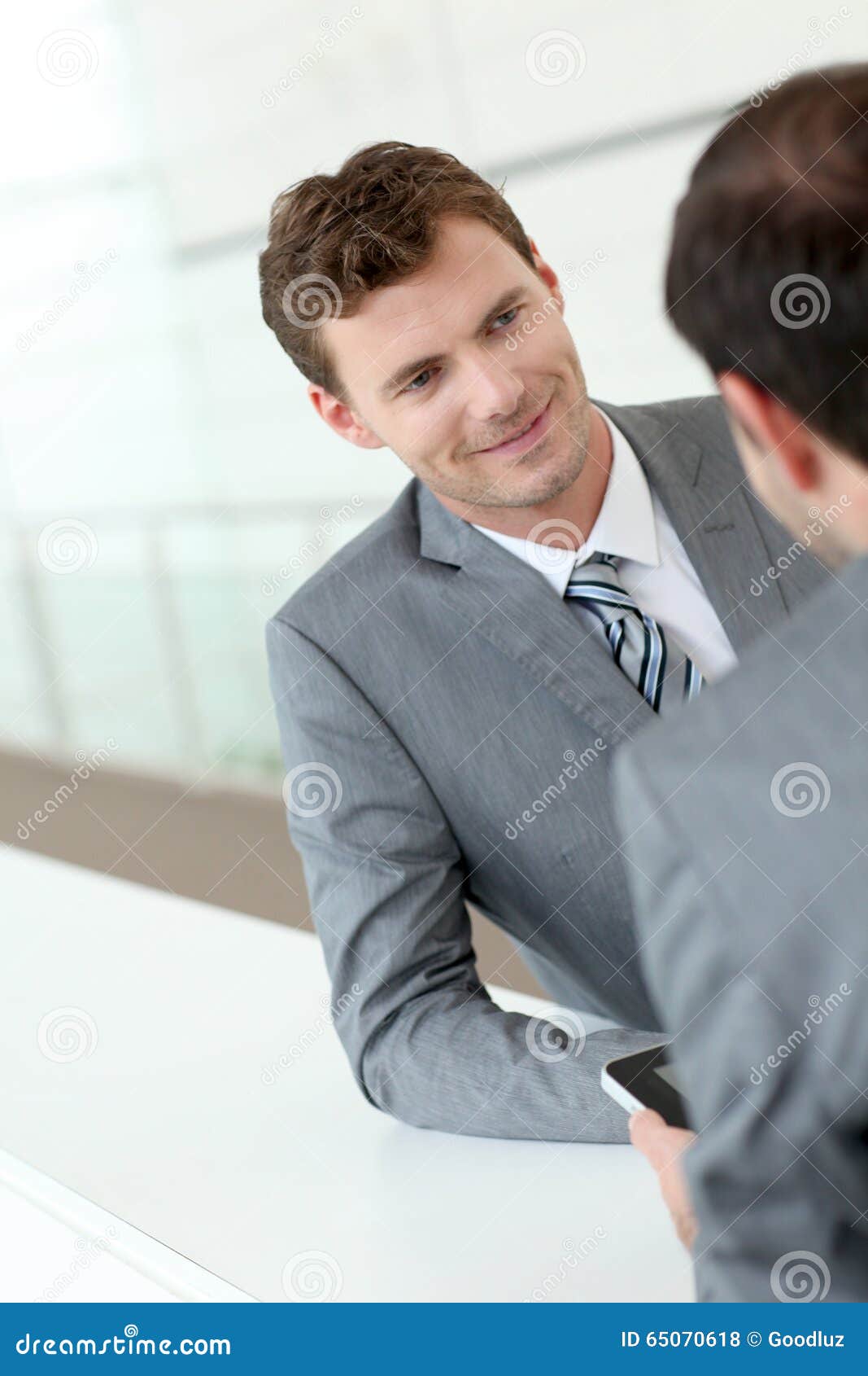 Business Meeting in Hallway Stock Photo Image of client, caucasian 65070618