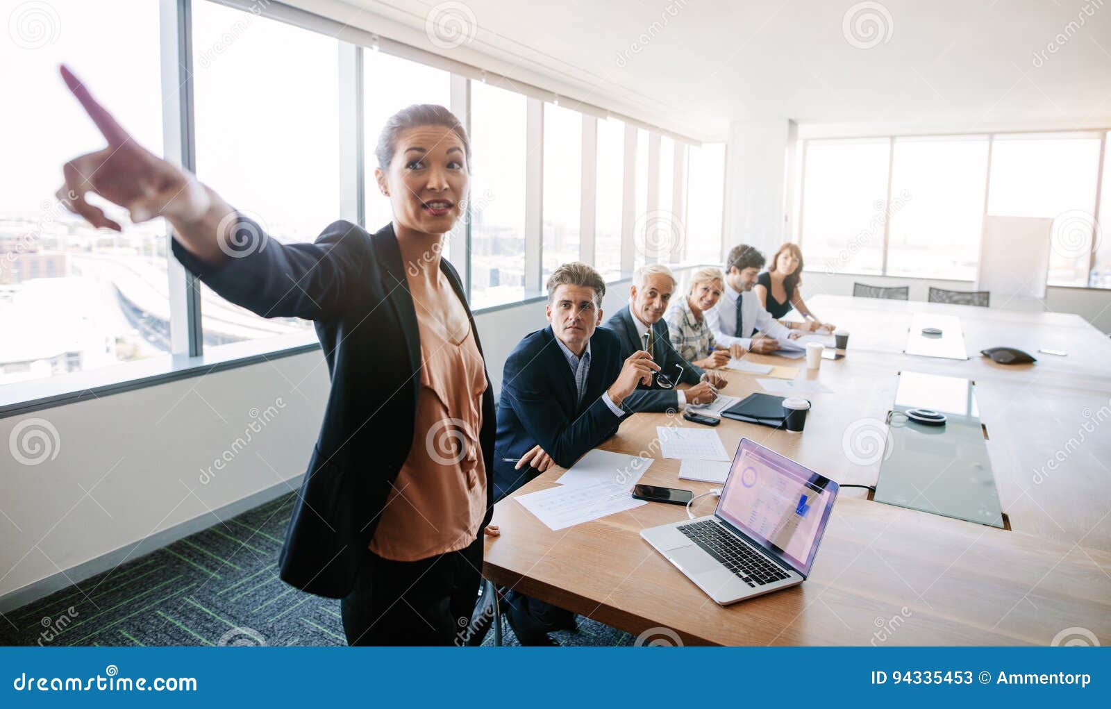 Business Meeting and Presentation in Conference Room Stock Image