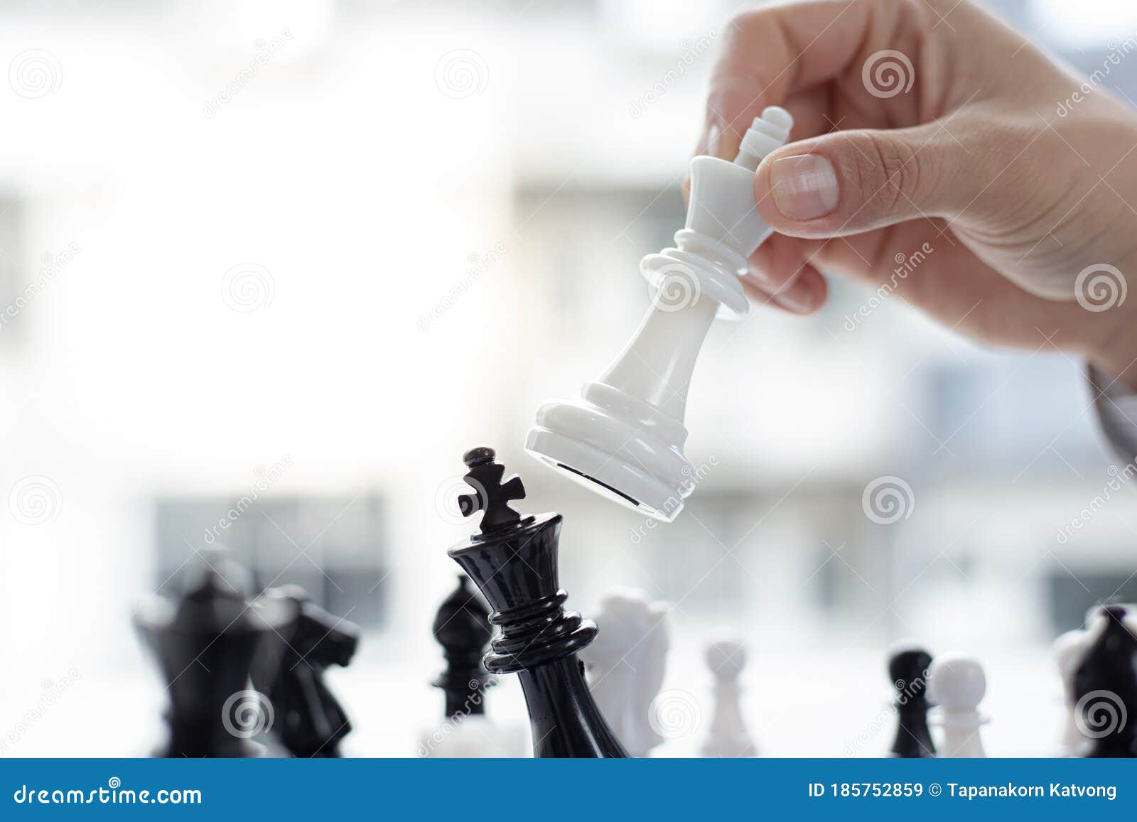 business men make plans to play chess with prudence and success