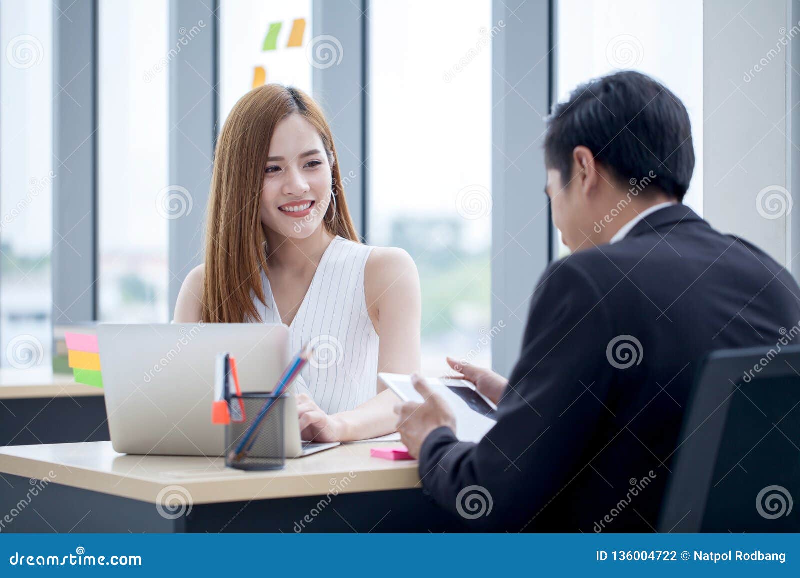 Business Partners Team Working Together On Desk With Laptop And