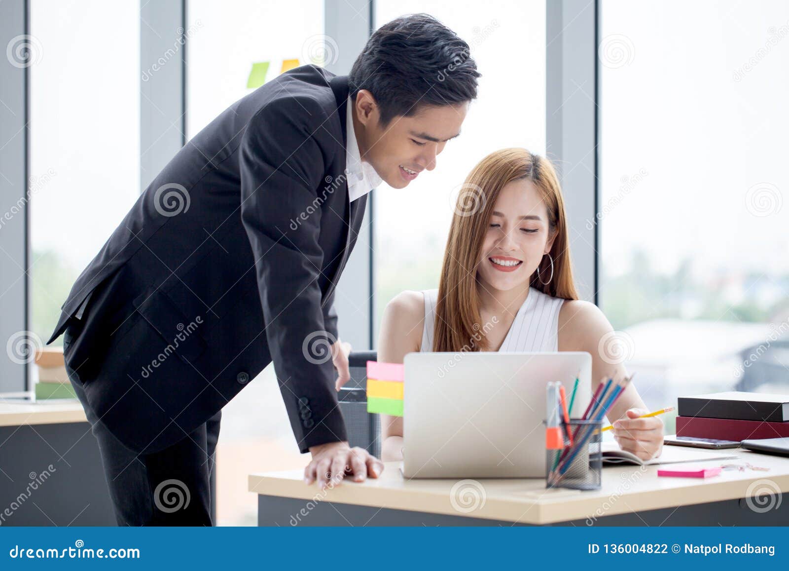 Business Partners Team Working Together On Desk With Laptop And