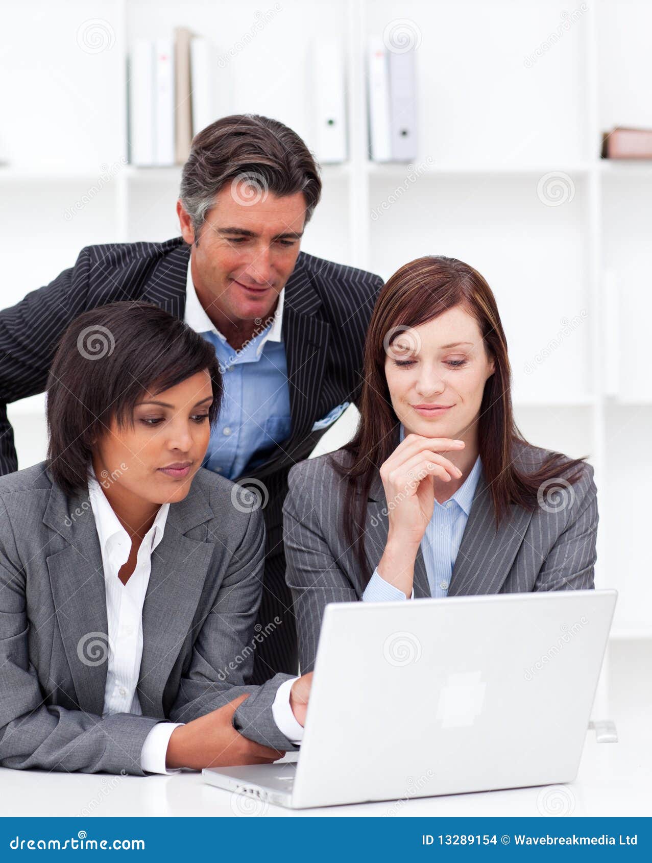 Business Partners Working at a Computer Stock Photo Image of happy
