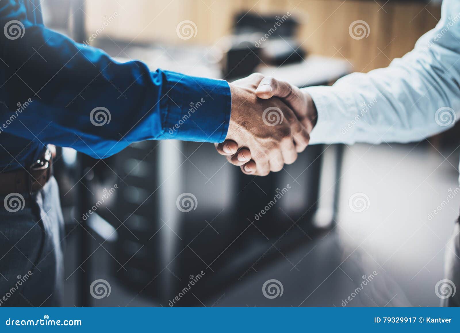 business partnership handshake concept.closeup photo of two businessmans handshaking process.successful deal after great