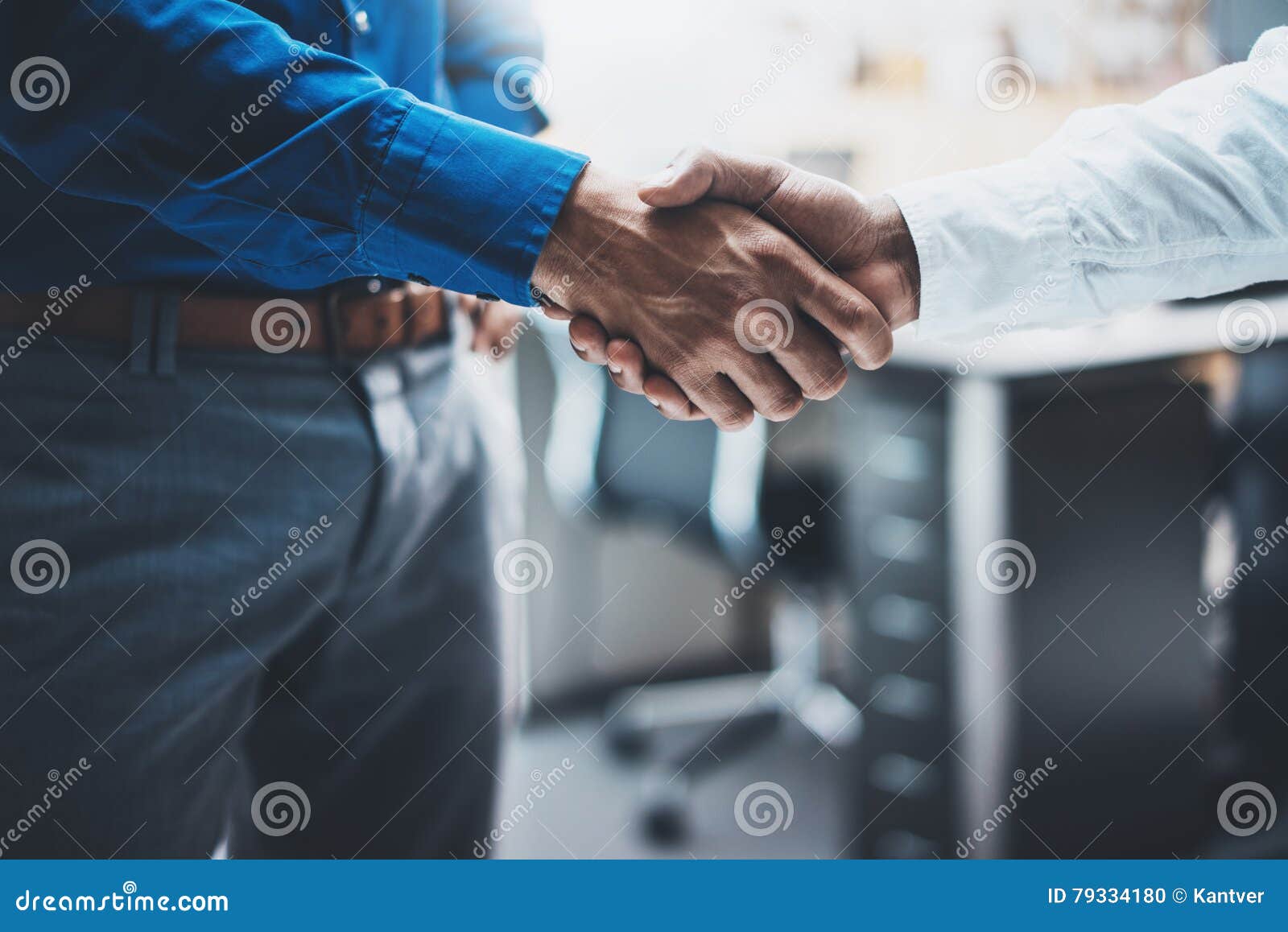 business partnership handshake concept.image of two businessmans handshaking process.successful deal after great