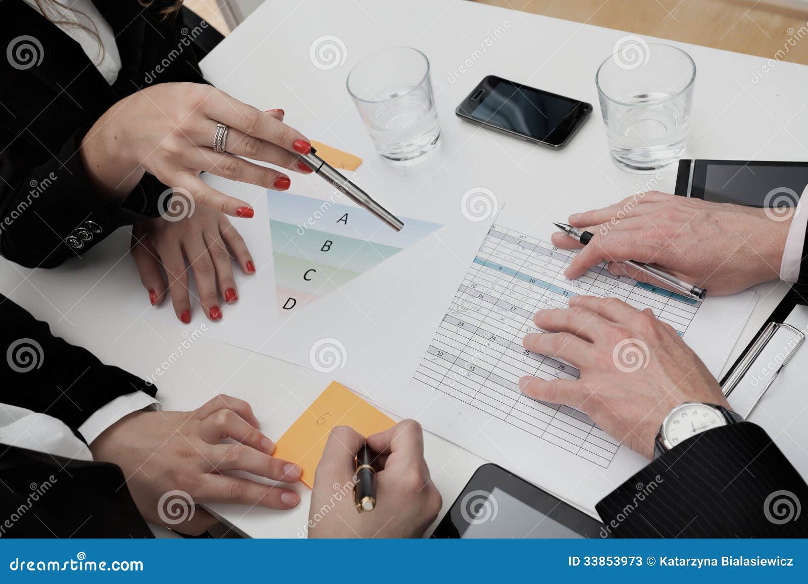 business people analyzing the agenda